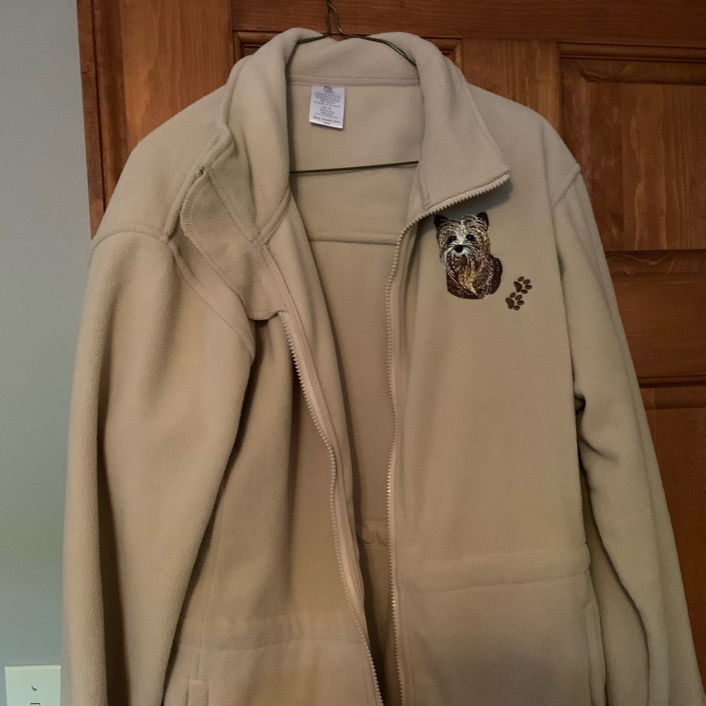 Light weight jacket with Yorkshire terriers on it